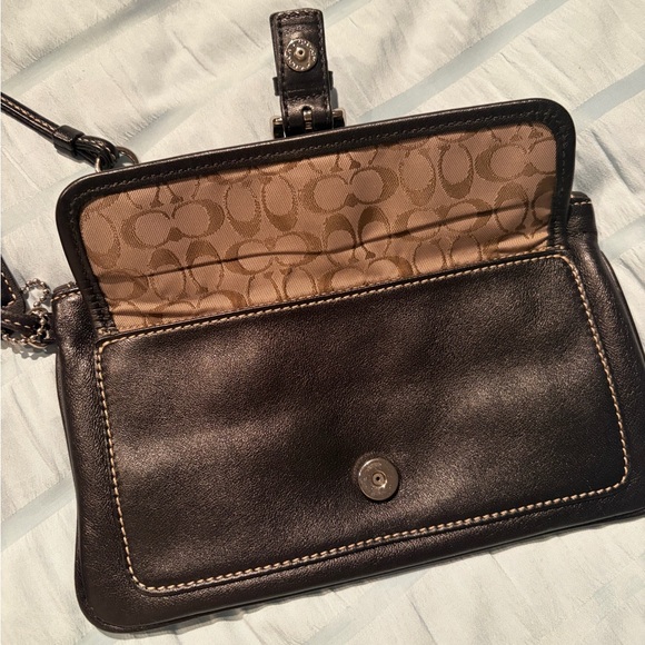 Coach Black Leather Wristlet with original pattern inside